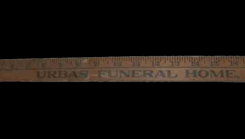 Urbas Funeral Home Yard Stick